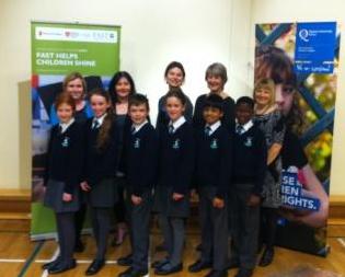 Photograph of children and researchers