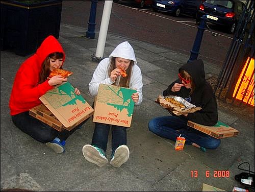 Photograph by Shannen Heaney, who won the 2008 Young Life and Times photograph competition.  The photograph shows Shannen and friends eating pizza in Portrush.