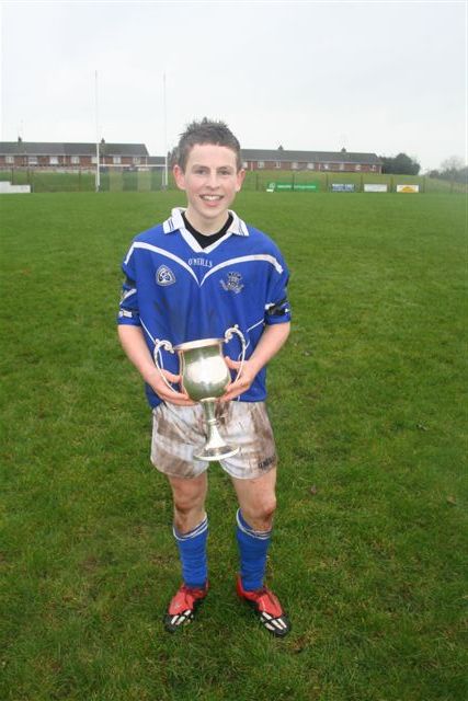 Photograph by Colin Stevenson who got third place in the 2008 Young Life and Times photograph competition.  The photograph shows Colin after he had won a cup for football.